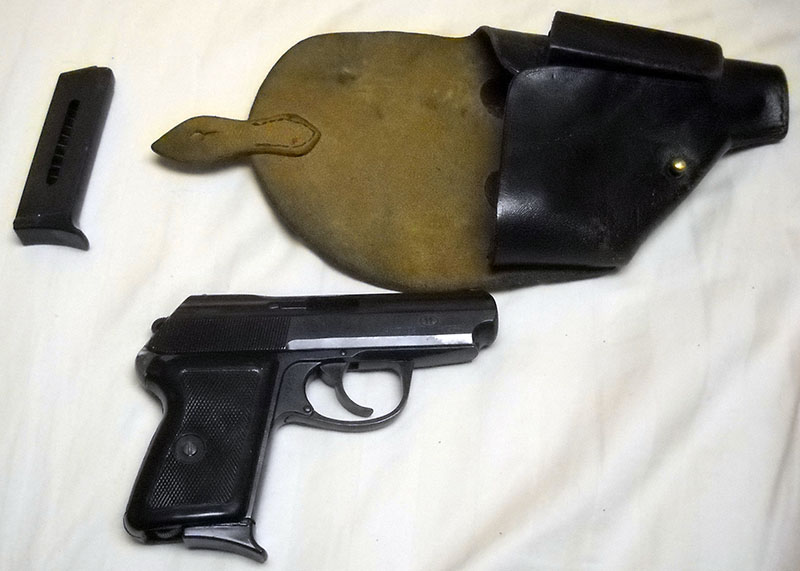 P-64 with holster and extra magazine